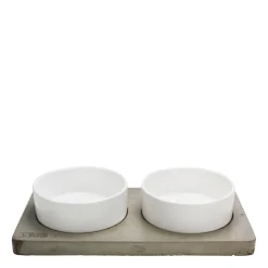Porcelain bowls on concrete slab