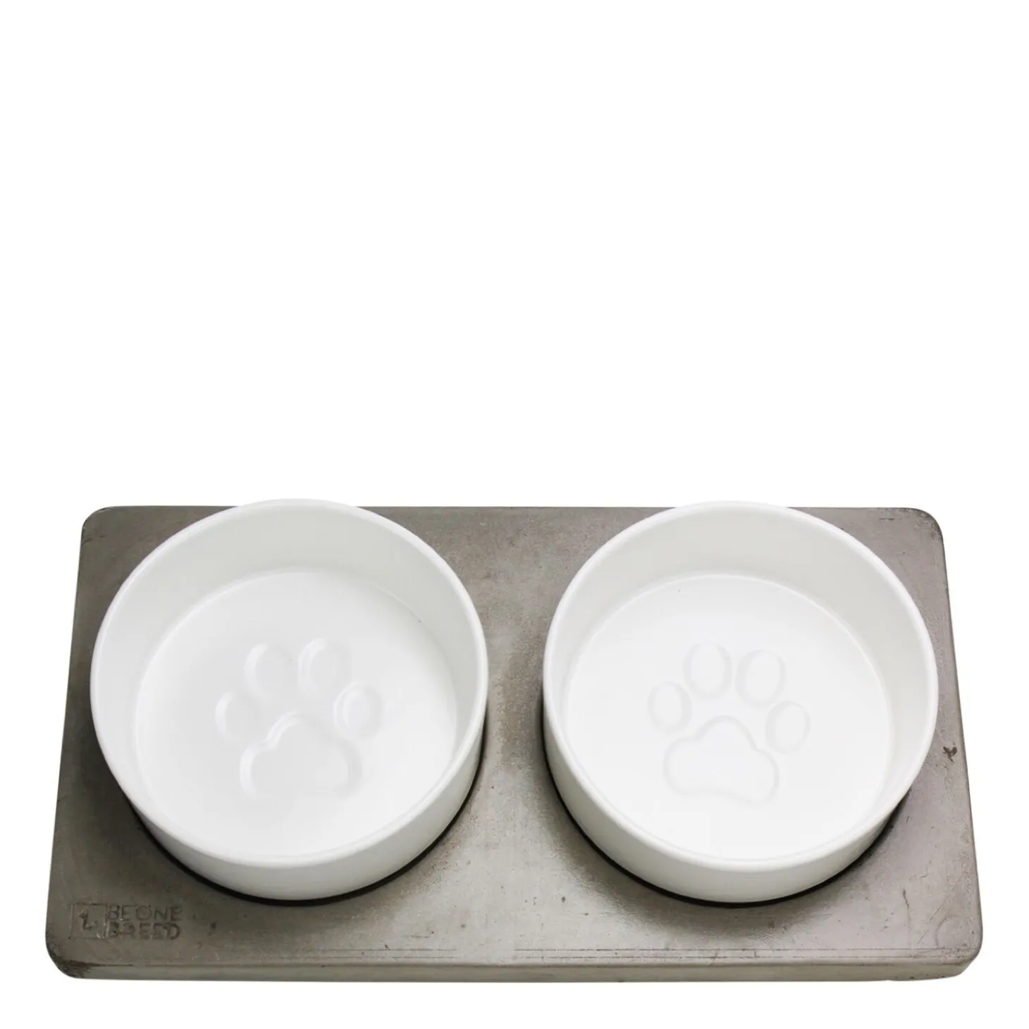 Porcelain bowls on concrete slab